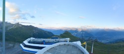 Archived image Webcam Crans Montana - Top station La Tsa chair lift 19:00