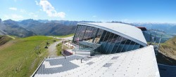 Archived image Webcam Axamer Lizum: Hoadl-Haus und Top station Olympiabahn 13:00