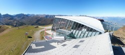 Archived image Webcam Axamer Lizum: Hoadl-Haus und Top station Olympiabahn 11:00