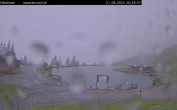 Archived image Webcam Engelberg: Lake Härzlisee & mountain restaurant Kräuterhütte 19:00