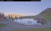 Archived image Webcam Engelberg: Lake Härzlisee & mountain restaurant Kräuterhütte 07:00