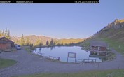 Archived image Webcam Engelberg: Lake Härzlisee & mountain restaurant Kräuterhütte 08:00