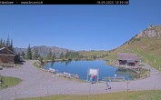 Archived image Webcam Engelberg: Lake Härzlisee & mountain restaurant Kräuterhütte 11:00