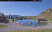 Archived image Webcam Engelberg: Lake Härzlisee & mountain restaurant Kräuterhütte 15:00