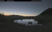 Archived image Webcam Engelberg: Lake Härzlisee & mountain restaurant Kräuterhütte 19:00